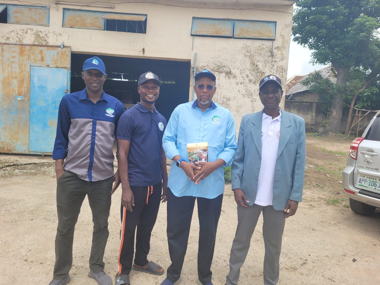 NEPC Coordinator visiting Akajuma warehouse with the team